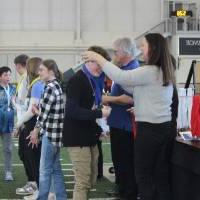 Giving medals at Awards Ceremony